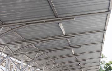 installing Cardinals Green metal roofing